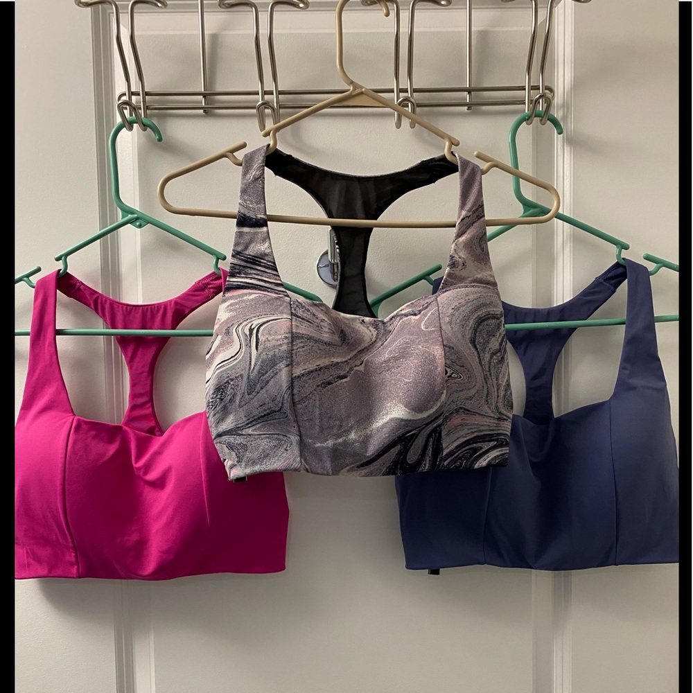 Victoria’s Secret pink, blue, and marble sports bras 34DD